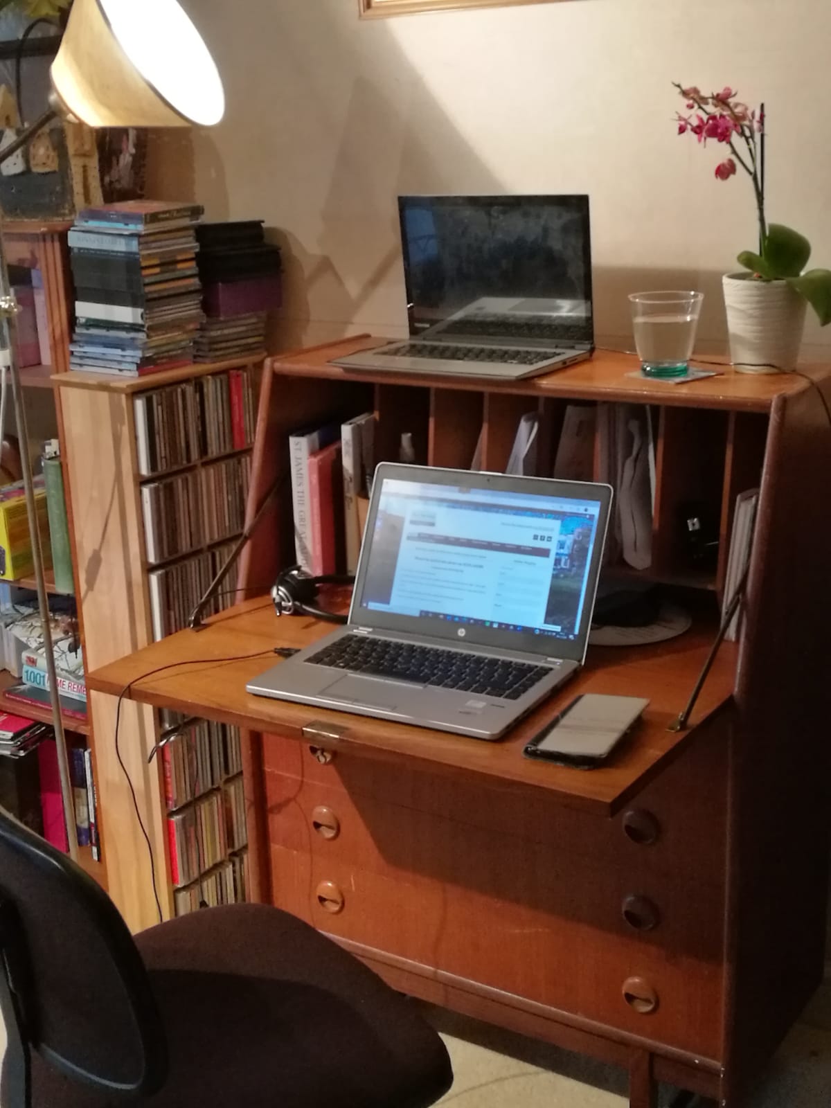 Desk with laptop and books